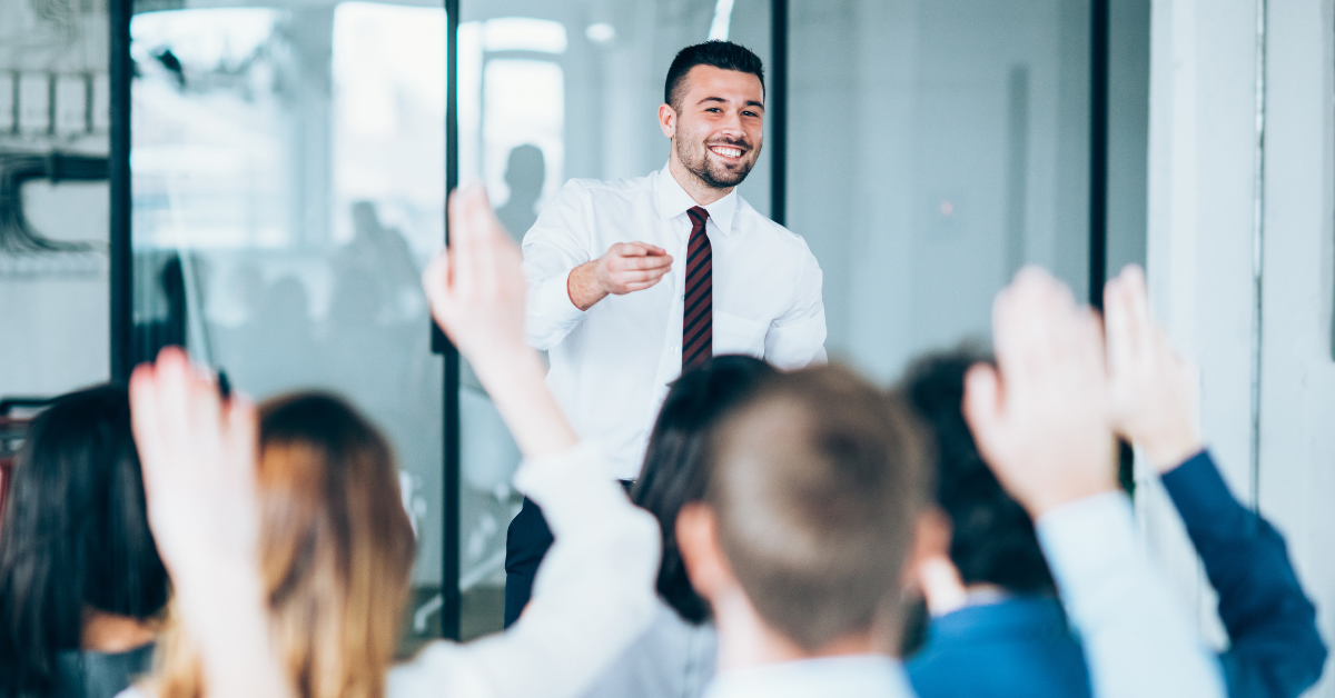 professional development speaker pointing audience professional development speaker pointing audience