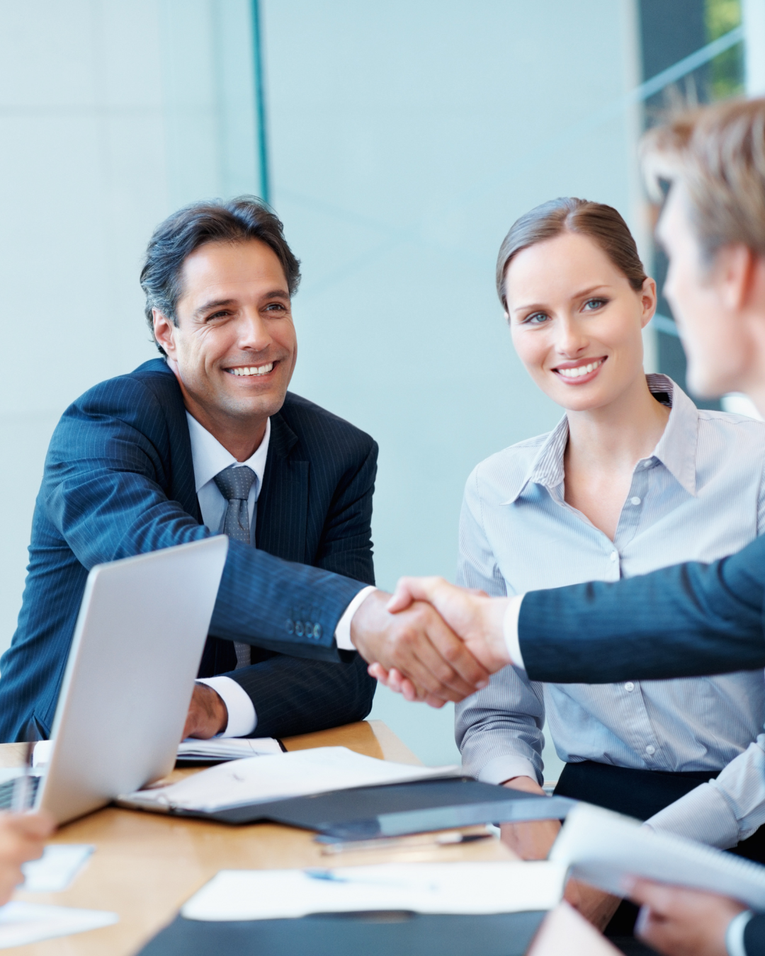 executive shaking hands employee executive shaking hands with employee