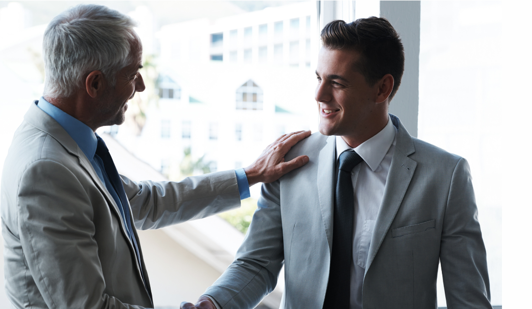 executive coach congratulating executive career advancement