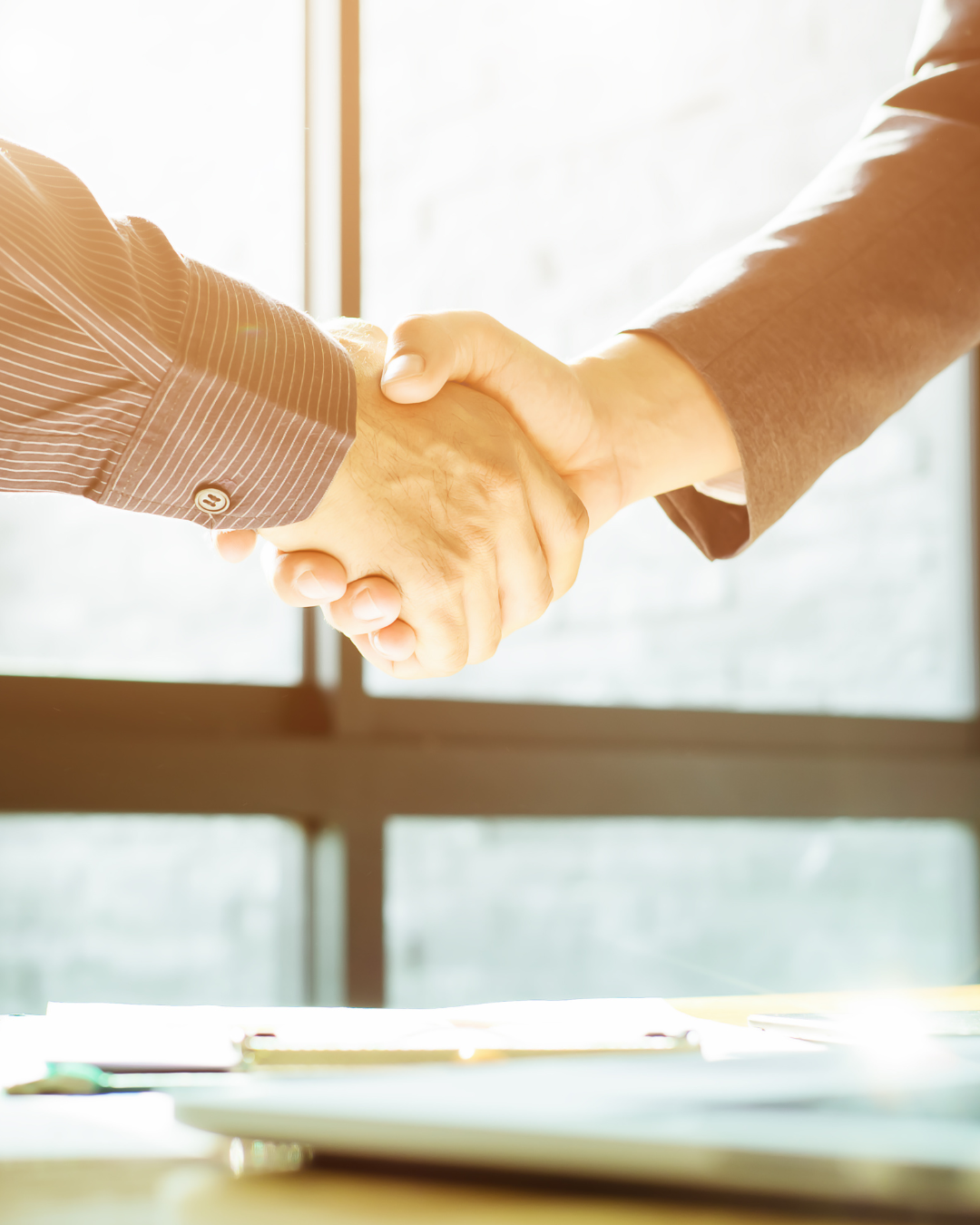 executives shaking hands executive coach executives shaking hands executive coach