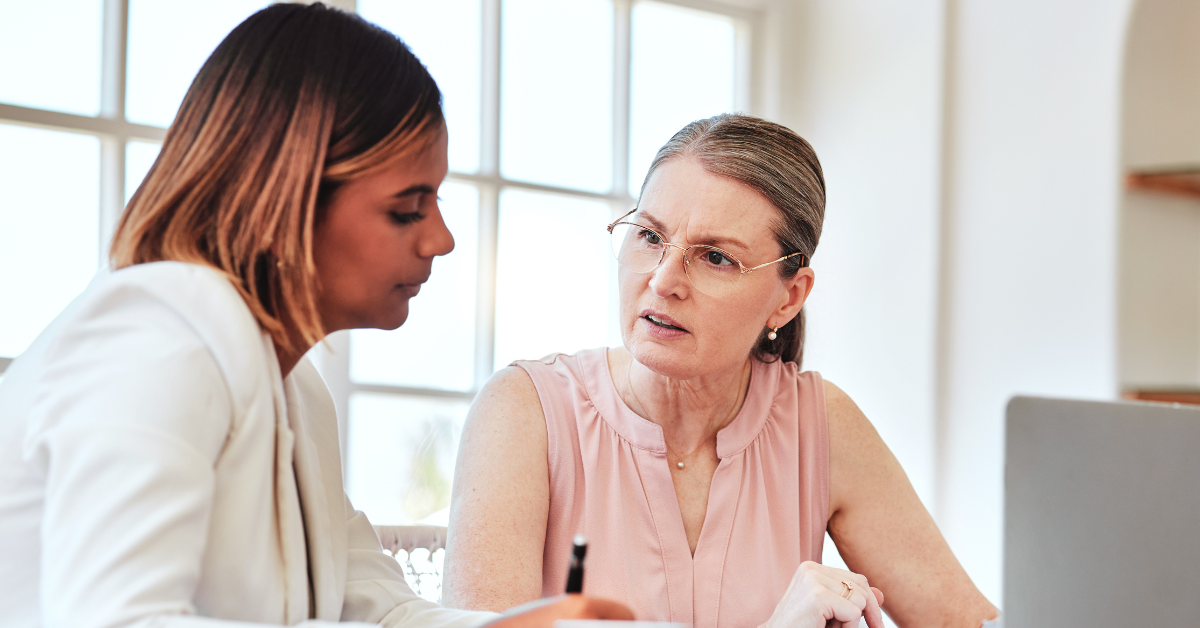 executive leader reflecting during a coaching session focused on personal development and mindset growth