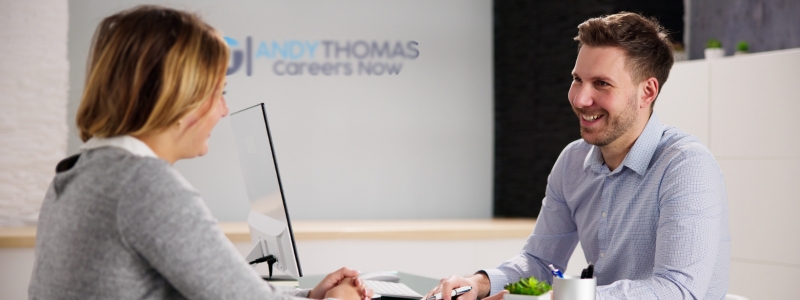 career coach giving interview preparation training to client in andy thomas careers now office